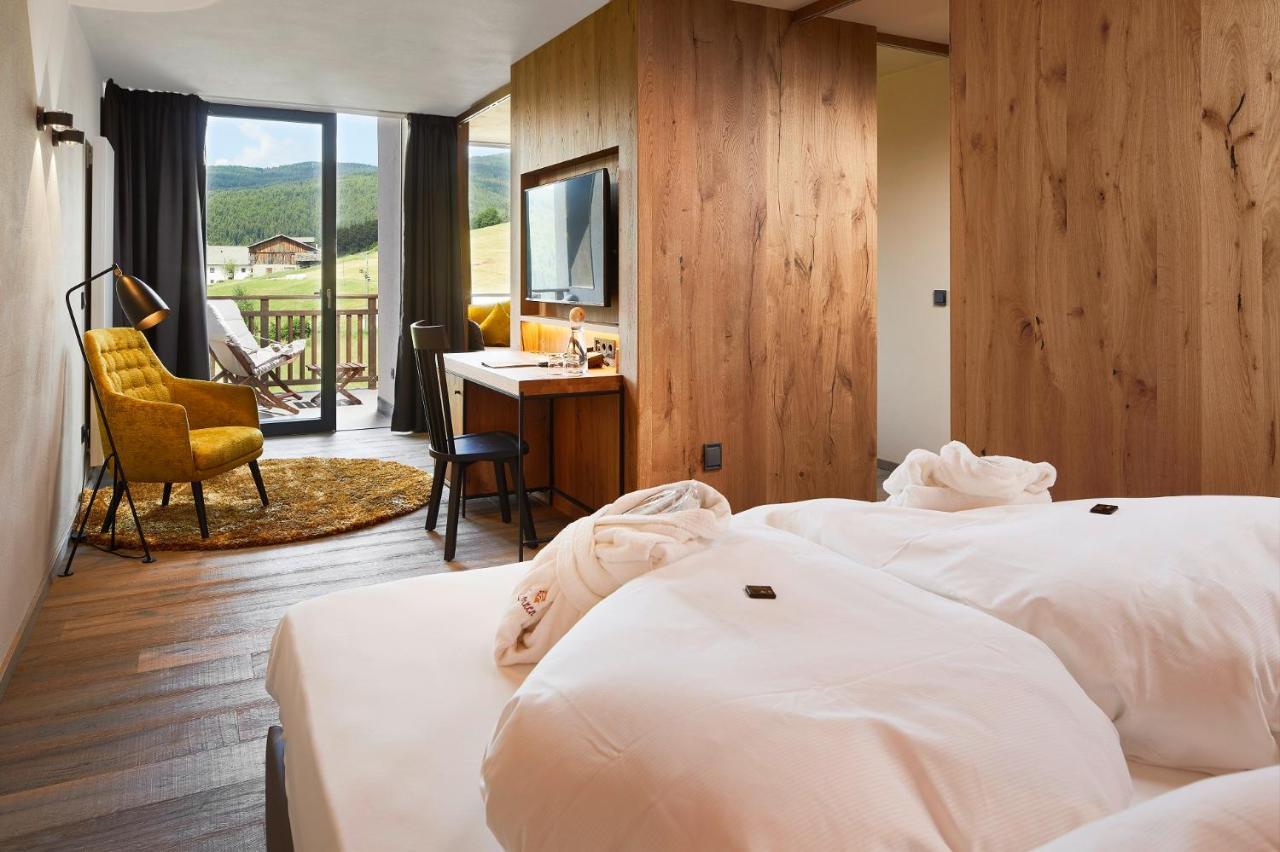 Hotel Sonnenberg Panorama Dolomites Wellbeing à Maranza Extérieur photo